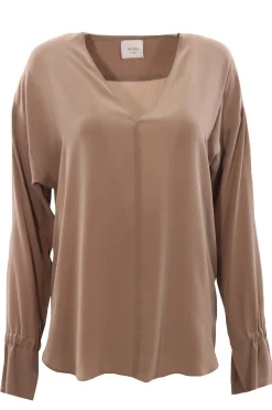 Blusa in seta collo a v